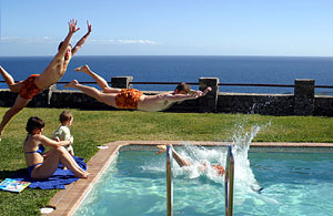 Alastair diving into a swimming pool