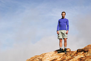 Dunstan standing on a rock in the Mont Blanc region